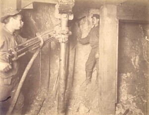 Mt Con 550 level East.  Showing drilling machine in operation.