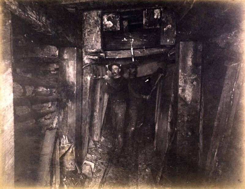 Mt Con 100 level Showing miners replacing and repairing old timbers